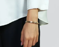 Bracciale argento dorato a tre fasce zigrinate Unoaerre