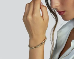 Bracciale argento dorato a tre fasce zigrinate Unoaerre