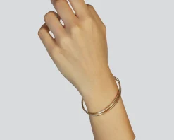 Bracciale argento dorato a tre fasce zigrinate Unoaerre