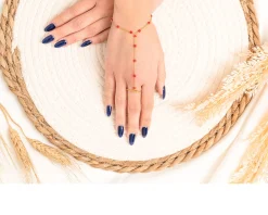 Bracciale baciamano argento rosè con anello e corallo rosso Selezione zanolli