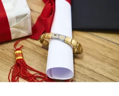 Bracciale composable acciaio dorato laurea e quadrifoglio Nomination