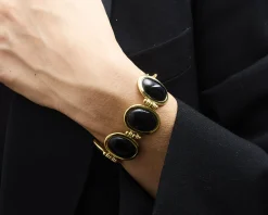 Bracciale ottone finitura oro con occhio di gatto nero Sovrani