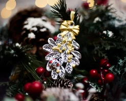 Idea regalo natale vischio oro e coccinella rossa Selezione zanolli