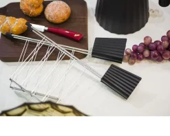 Set pinze plissè nero (2 pezzi) Alessi