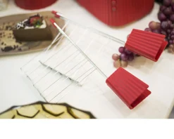 Set pinze plissè rosso (2 pezzi) Alessi